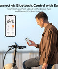 Man connecting L20 3.0 Electric Bike For Adults With App IoT Anti Theft via Bluetooth using a smartphone, bike handlebars visible