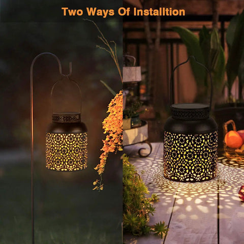 Outdoor Solar Lanterns Pack of 2 Waterproof Hanging Lanterns With Handles illuminating a garden scene at night