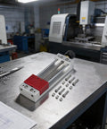 Compact Vise With Screw And Double Guide Rods For Rock Solid Clamping On Welding Tables And CNC Drilling Machines Perfect For Small PCB Components And Mini Vise Set With Grooved Mounting For Secure Easy Setup, aluminum mini vise on CNC table with screws