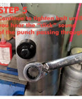22mm And 20mm Hole Punch Kit with Knockout Die and Punch Set in use with wrench tightening bolt in metal sheet.