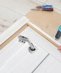 Stainless Steel Cabinet Door Hinges 4 Pack For Easy Diy Install 135 Degree Hidden Corner Hinges in use on a kitchen cabinet