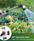 Beefy Heavy Duty 16 Inch Metal Watering Wand With 8 Spray Patterns in use watering shrubs in garden