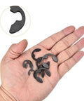 Hand holding 200 Pcs E Clip Circlip External Retaining Rings Kit With Ten Sizes M1 5 To M10 In 65Mn Carbon Steel Snap Rings