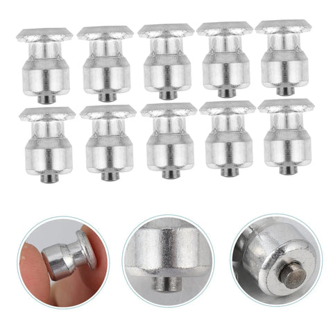 Killer Winter Tire Studs For Cars Trucks And Motorcycles Tungsten Steel Spikes set of twelve pieces viewed from above.
