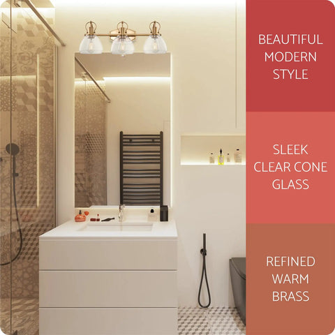 Three Light Vanity Bathroom Light With Clear Glass Shades In Warm Brass Finish above modern bathroom vanity
