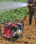Heavy Duty Workhorse 7.5HP 212CC Gas Water Pump 2 Inch Twin Impeller High Pressure Transfer Machine in use.