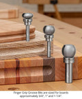 Finger Grip Groove Router Bit For One Inch Boards With One Quarter Inch Shank Template Pattern Bearing Two Flute Pro Grade Carbide Tipped Bearing Guided Precision For Serving And Cutting Boards USA Made shown in a workshop on wood boards
