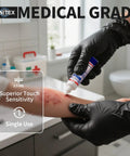 Person applying ointment with Heavy Duty 3.5 Mil Nitrile Disposable Gloves In Bold Black, Fully Latex Free And Tear Resistant.