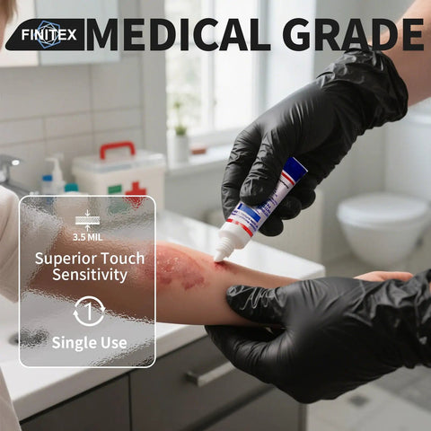 Person applying ointment with Heavy Duty 3.5 Mil Nitrile Disposable Gloves In Bold Black, Fully Latex Free And Tear Resistant.