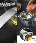 Stainless Steel Egg Separator And Yolk White Filter No Mess Kitchen Gadget shown on a glass bowl with cracked egg use