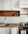 Modern kitchen with white cabinets featuring 25 Pack Cabinet Knobs And Drawer Pulls Set Brushed Satin Nickel 1.18 Inch Round Zinc Alloy.