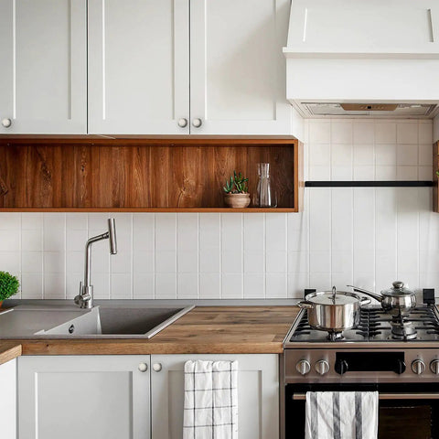 Modern kitchen with white cabinets featuring 25 Pack Cabinet Knobs And Drawer Pulls Set Brushed Satin Nickel 1.18 Inch Round Zinc Alloy.