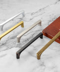 10 Pack Antique Brass Drawer Pulls 3 Inch Vintage Cabinet Handles shown with different finishes on marble surface
