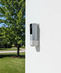 Wall Mount Bracket For Rapsodo MLM2Pro Launch Monitor With Secure Fastening installed outdoors on white wall