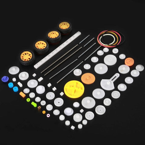 78 Piece Plastic Gear Kit For Motors And Robots with axles, gears, tires, racks, and bushings shown on black background