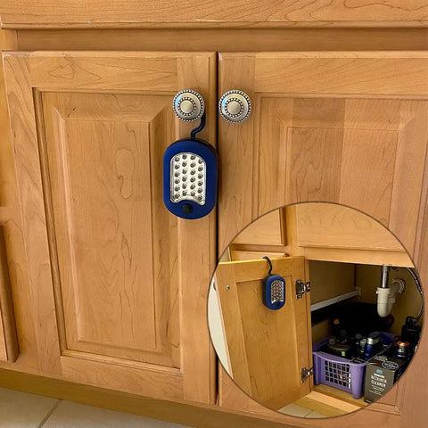 Magnetic LED Work Light Six Pack With 27 LED Lights And Swivel Hook attached to kitchen cabinet door, lighting inside