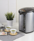 Micom Water Boiler And Warmer With 4 Liter Capacity 135 Oz Silver Finish Micro Computerized Temperature Control on a countertop