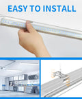 LED Shop Light Two Foot Energy Saving 20W 3000LM 6500K Daylight T8 Tube being installed in garage ceiling