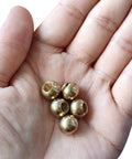 Five brass M6x1 thread cap nuts knob set for furniture and lighting shown in a hand, easy install, no tool needed.