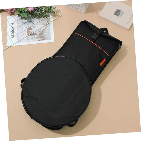 Lock Down Your Percussion Rig With This Straight Up Tough Oxford Fabric Dumb Drum Storage Bag And Snare Accessory Pouch, black with red accents.
