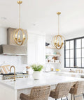 Gold Orb Chandelier Pendant Light Three Light Globe Fixture Modern Luxury Dining Room Foyer Kitchen Bedroom With Adjustable Height Openwork Metal Spheres For A Luxe Glam Vibe over kitchen island