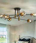 Lit Modern Glass Globe Sputnik Chandelier Flush Mount Ceiling Light in Black and Gold finish for dining room or kitchen decor