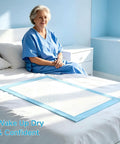 Top Shelf Super Absorbent Disposable Adult Bed Pads, Extra Large Heavy Duty Incontinence Underpads on a bed with an elderly woman sitting.