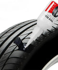 Hardcore Pro Tire Repair Glue For Fast Emergency Flat Repairs And Worn Sidewall Cracks Durable All Weather Road Ready Auto Rubber Sealant applied to a tire.