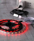 Six Piece 4 Pin RGB Extension Cable Kit With 12 Pin Plugs for 5050 and 3528 RGB LED Strip Lights on wooden surface