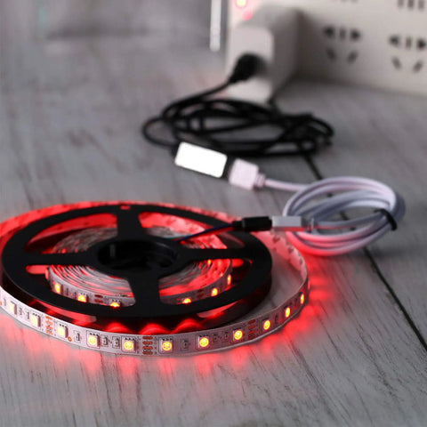 Six Piece 4 Pin RGB Extension Cable Kit With 12 Pin Plugs for 5050 and 3528 RGB LED Strip Lights on wooden surface