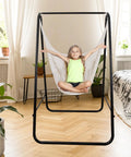 Boho Macrame Hammock Chair Hanging Rope Ceiling Swing For Indoor And Outdoor Use, supports up to 330 lbs, in beige, in bedroom.
