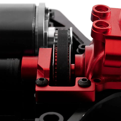Close-up of Race-Grade TT02 Belt Drive RC Car Transmission System with 36T Aluminum Pulley and 16T Gear, red components visible.
