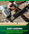 Hand holding Half Inch Crown Stapler For Insulation Sheathing And Subfloor Install 16 Gauge Nailer, top load for easy use
