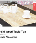 Three Tier Industrial Rolling Bar Cart With Thick Oak Shelves And Silent Casters For Living Room Hosting Hella Smooth Mobile Serving Trolley Top Shelf Storage Rack featuring a solid wood table top with drinks.