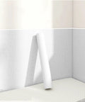 Linen Peel And Stick Wallpaper With Thick Foam Backing Fully Waterproof Self Adhesive wall decal on a white wall corner.