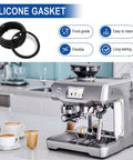 Upper Burr Rubber Seal Replacement For Espresso Grinders Silicone Gasket in front of espresso machine