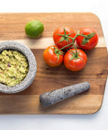 Heavy Granite Mortar And Pestle Set 2 Cup Capacity For Spices Herbs Seasonings Pastes Pesto And Guacamole on cutting board