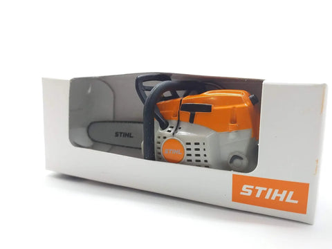 Battery Operated Chainsaw Keyring With Realistic Sound Effects, orange mini tool charm in branded box, side view