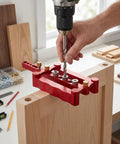 Adjustable Self Centering Doweling Jig Kit For Dead On Furniture Assembly And Heavy Duty DIY Woodworking Projects With Pro Shop Grade Clamp Drill Guide in use with drill.