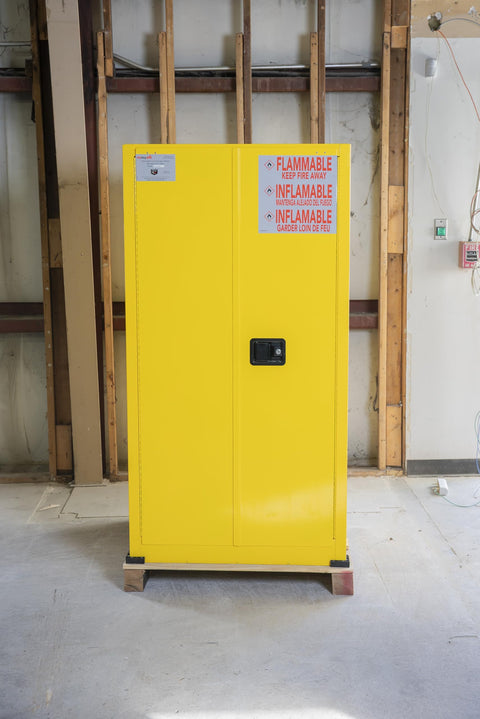 Heavy Duty 60 Gallon Flammable Safety Cabinet With Automatic Door, yellow, secure for combustible liquid storage, OSHA compliant.