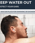 Man using wax ear plugs for swimming or showering, keeping water out and protecting ears.