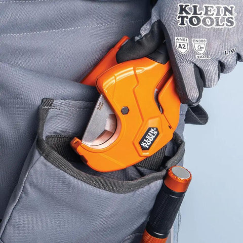 Ratcheting PVC Pipe Cutter For One Handed Use That Cuts One And A Quarter Inch ID PVC CPVC And PEX in tool belt pocket