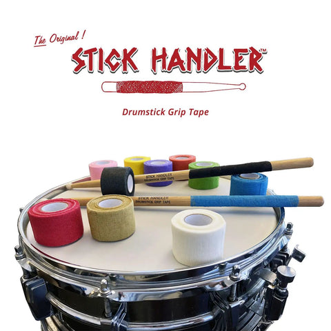 Pro Level Anti Slip Drumstick Grip Tape Four Pack Tan Cotton Gauze Percussion Accessory on snare drum with various tape rolls.