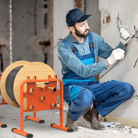 Worker using Heavy-Duty Adjustable Wire Dispenser And Welded Steel Spool Rack For Heavy Cables Portable Cable Caddy on site