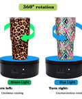 Black Motorized Rotating Display Stand, 360 Degree Automatic Silent Turntable For Epoxy Glitter Tumblers And Cups showing two tumblers rotating.