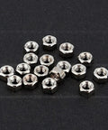 Precision Crafted Micro Stainless Steel Screws For Professional Watch Repairs And Antique Clock Restoration Hella Durable Tiny Watchmaker Parts Collection featuring small metallic nuts.