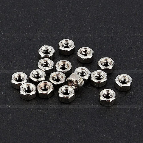Precision Crafted Micro Stainless Steel Screws For Professional Watch Repairs And Antique Clock Restoration Hella Durable Tiny Watchmaker Parts Collection featuring small metallic nuts.