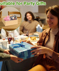 Woman receiving a blue gift box at a dinner party, with an inset showing a box of assorted colorful socks labeled 'Suitable for Party Gifts'.
