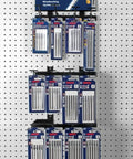 Heavy Duty High Carbon Steel Jig Saw Blades T Shank Grip With 6 Teeth Per Inch For Lightning Fast Wood Cuts And Ripping Through Solid Lumber Like Butter Pack Of Three displayed on pegboard.