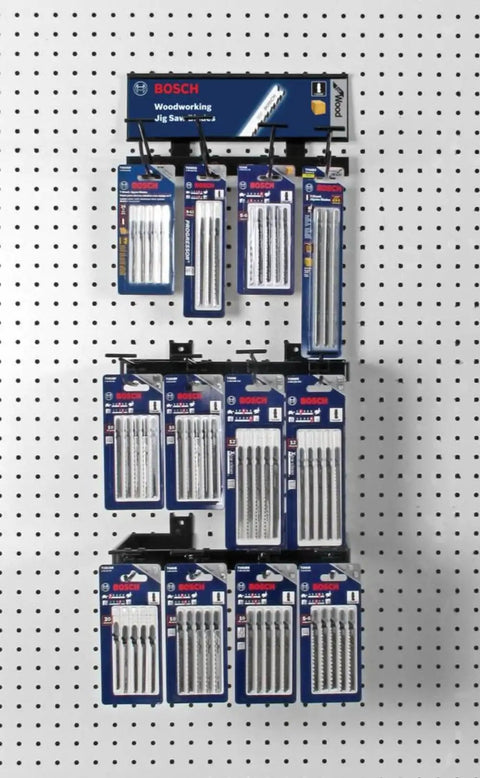 Heavy Duty High Carbon Steel Jig Saw Blades T Shank Grip With 6 Teeth Per Inch For Lightning Fast Wood Cuts And Ripping Through Solid Lumber Like Butter Pack Of Three displayed on pegboard.